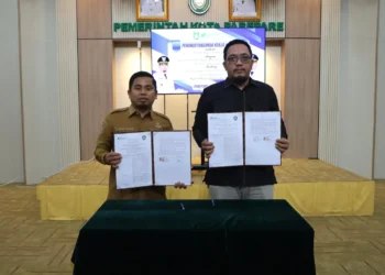 Tandatangani Kerja Sama Program Jaminan Sosial Ketenagakerjaan bagi Pekerja Rentan dan Miskin