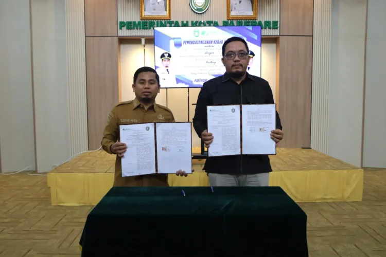 Tandatangani Kerja Sama Program Jaminan Sosial Ketenagakerjaan bagi Pekerja Rentan dan Miskin