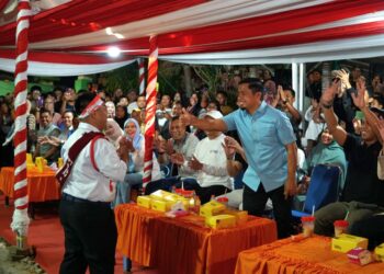 Semarak HUT ke-81 RI, Tasming Hamid Beri Semangat Peserta Gerak Jalan